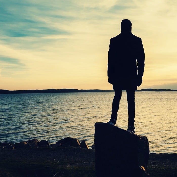 lonely man on beach