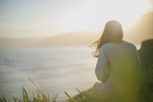 woman watching sunset