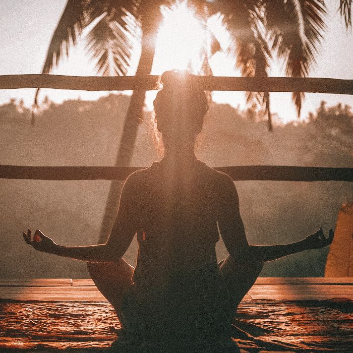 woman in jungle meditating